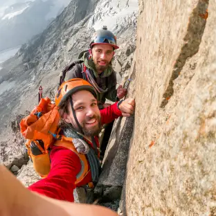 Climber assessing a route that matches their skill level in Whistler